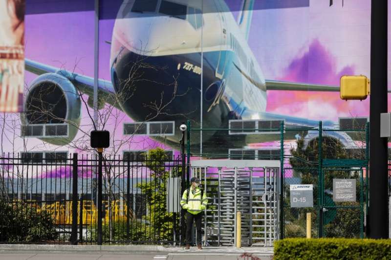 Boeing is set to lay off workers just one day after re-opening its plants in Washington state