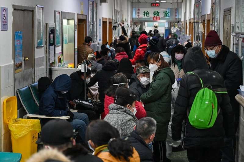 Crowds wait for medical attention at Wuhan Red Cross Hospital on January 25, 2020