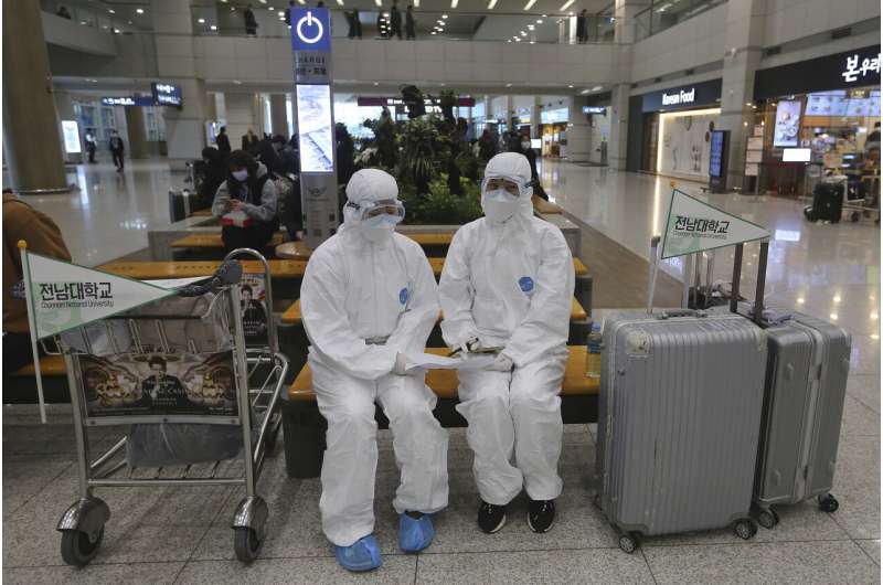 Desperate to stop virus' spread, countries limit travel