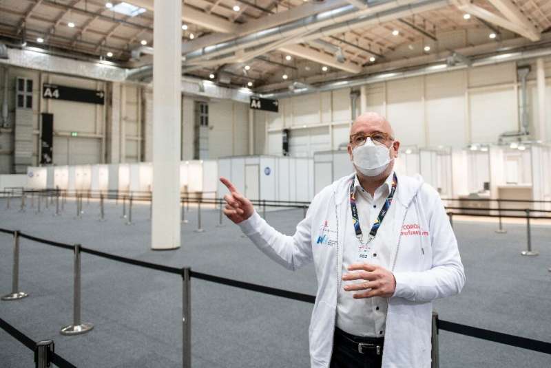 Dirk Heinrich, a senior physician at a vaccination centre in Hamburg, shows off the facilities