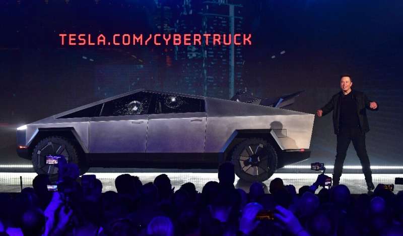 Elon Musk presents the all-electric battery-powered Tesla Cybertruck in November 2019. Analysts are expecting Tesla to have made