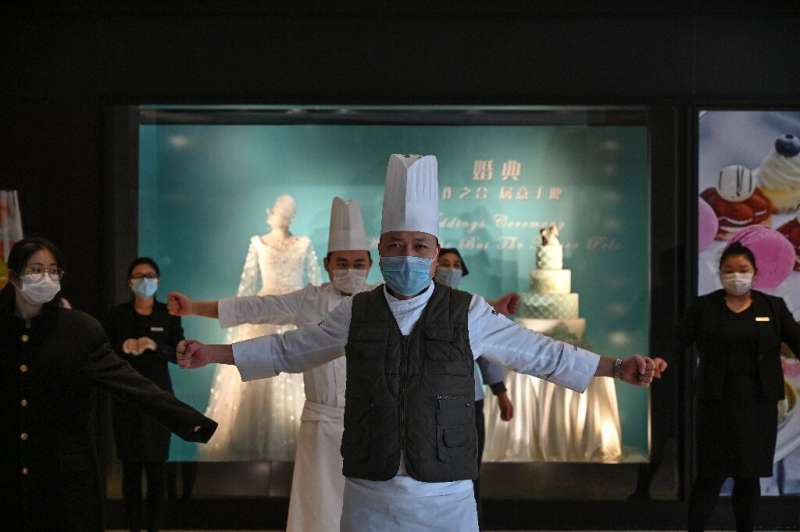 Employees at a hotel in Wuhan, China on January 28, 2020
