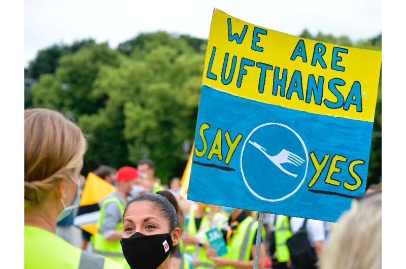 Employees of German airline Lufthansa hit the streets to encourage shareholders to back a bailout plan