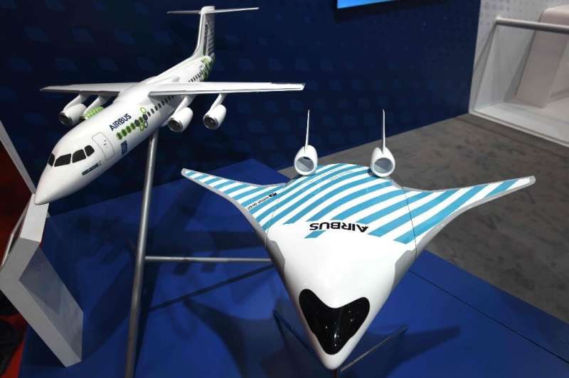 European plane maker Airbus has unveiled a model of a futuristic jet dubbed Maveric (right) which it says has the potential to c