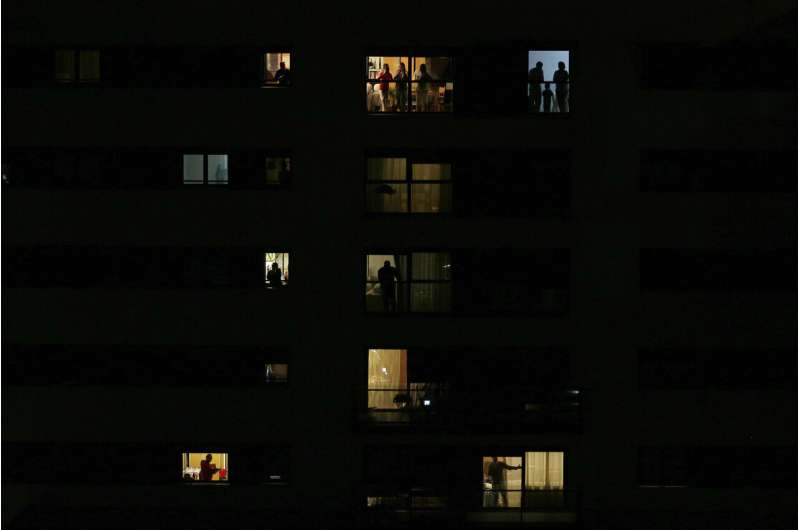 Europeans sing health workers' praises nightly from windows