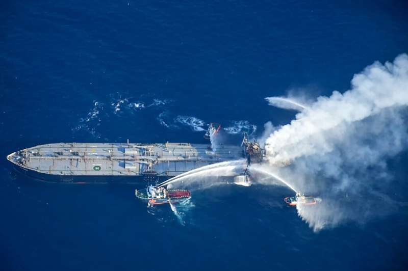 Fireboats battling to extinguish a fire on the Panamanian-registered crude oil tanker New Diamond off Sri Lanka's eastern coast