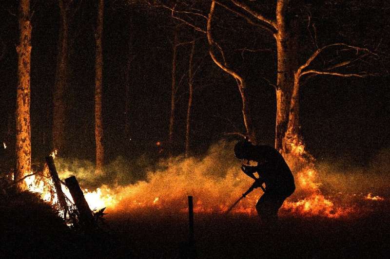 Firefighters—many of them volunteers—are working around the clock to save people and property