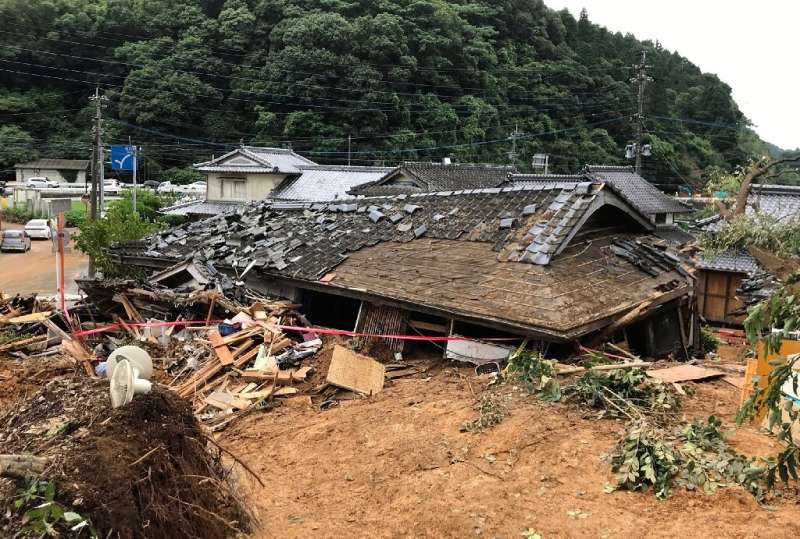 Flooding and mudslides in Japan's Kumamoto region have destroyed houses and swept away vehicles