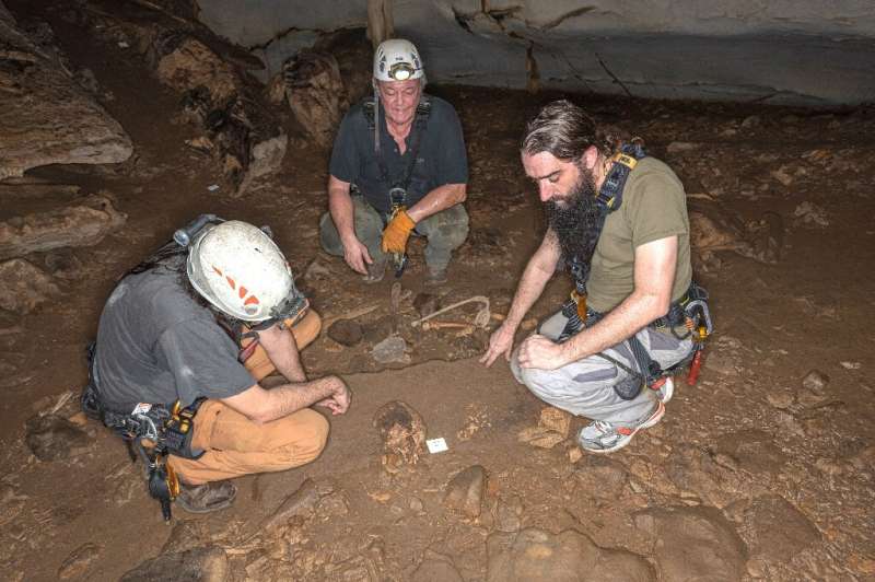 French geo-archeologists and anthropo-biologists study remains in the Iroungou cave, southern Gabon