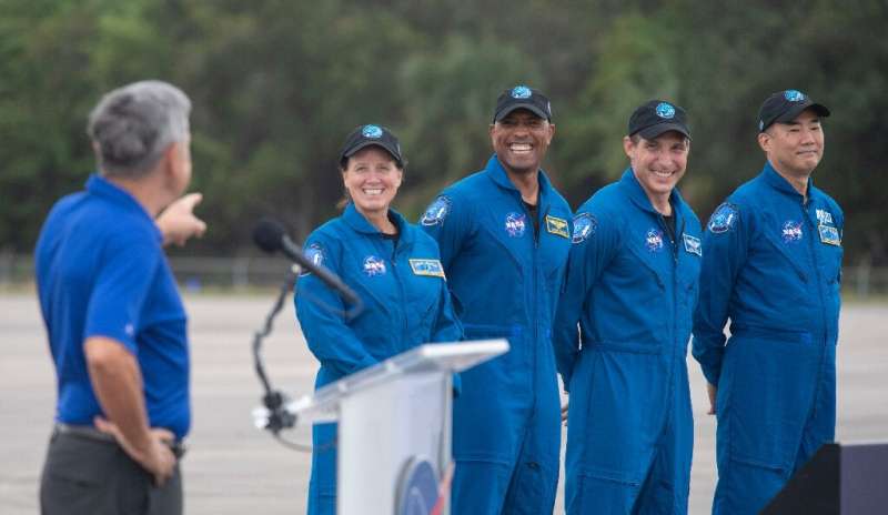 From left to right: NASA astronauts Shannon Walker, Victor Glover and Mike Hopkins, and Japanese astronaut Soichi Noguchi, seen 