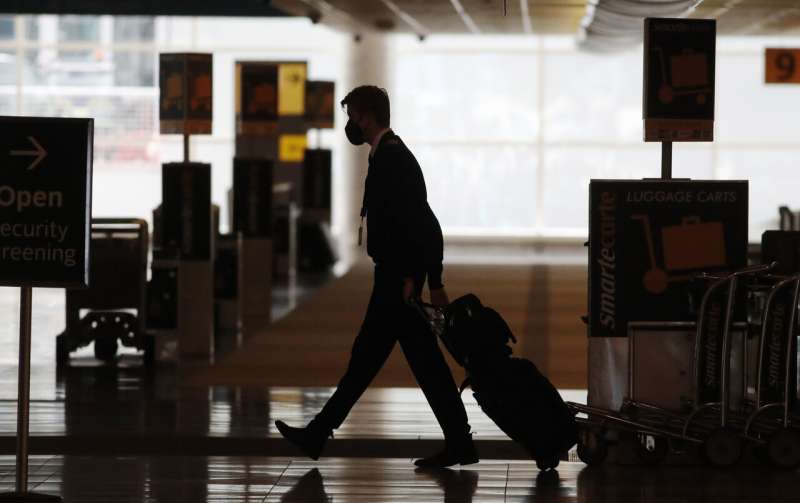 Future of business travel unclear as virus upends work life