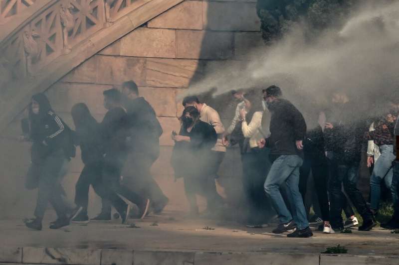 Greek police used tear gas and water cannon to disperse a demo staged in defiance of a ban imposed because of the pandemic
