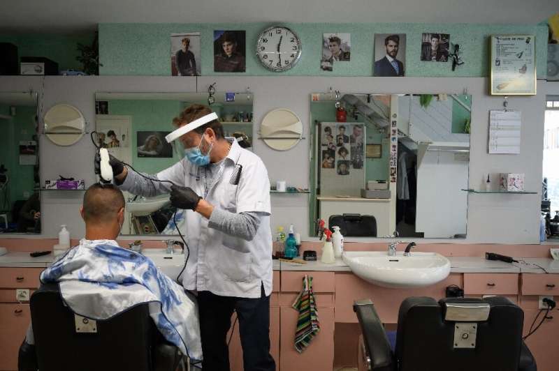 Hairdressers in Switzerland were allowed to reopen, but had to put protective measures in place