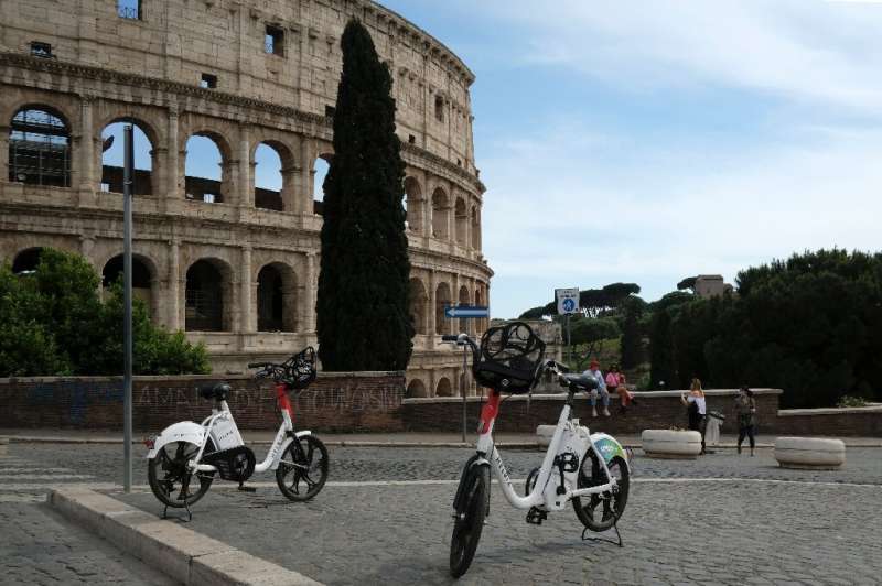 Helbiz electric bikes outside the Colosseum in Rome on May 28, one of the &quot;micromobility&quot; services seeing increased us