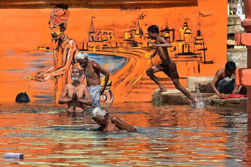 Hindu devotees bathe in Jabalpur on the occasion of Akshaya Tritiya, a annual spring festival which is believed to bring good lu