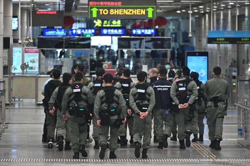 Hong Kong began enforcing a two-week quarantine for anyone arriving from mainland China, under threat of both fines and jail ter