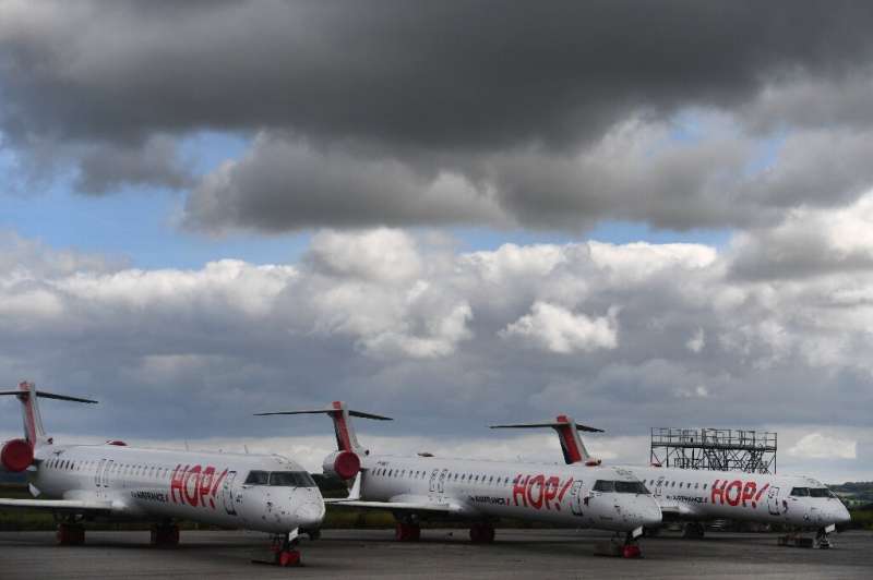 Hop! aircraft are pictured on the tarmac on July 3, 2020 at the Morlaix, France airport
