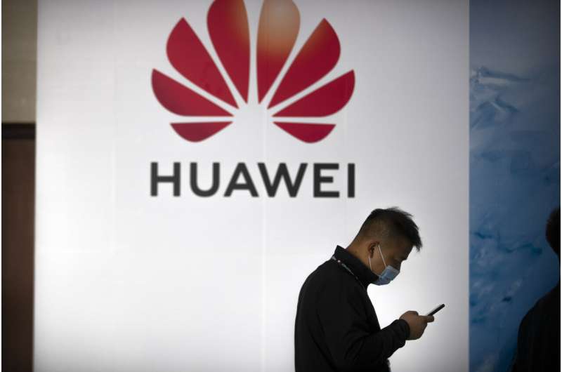 Huawei sales up, but growth slows under virus, US pressure