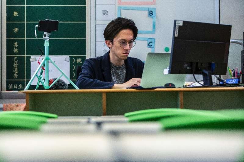 In Hong Kong, some teachers are offering students lessons online during the closure