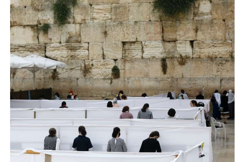 In Jerusalem, special measures have been put in place to ensure those praying at the Western Wall keep a safe distance from each