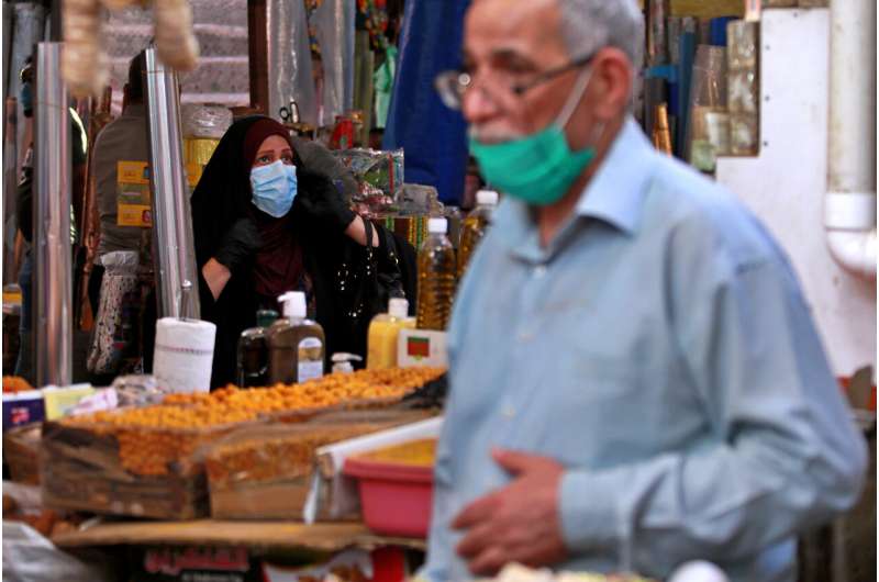 Iraq faces full local lockdowns as virus cases jump