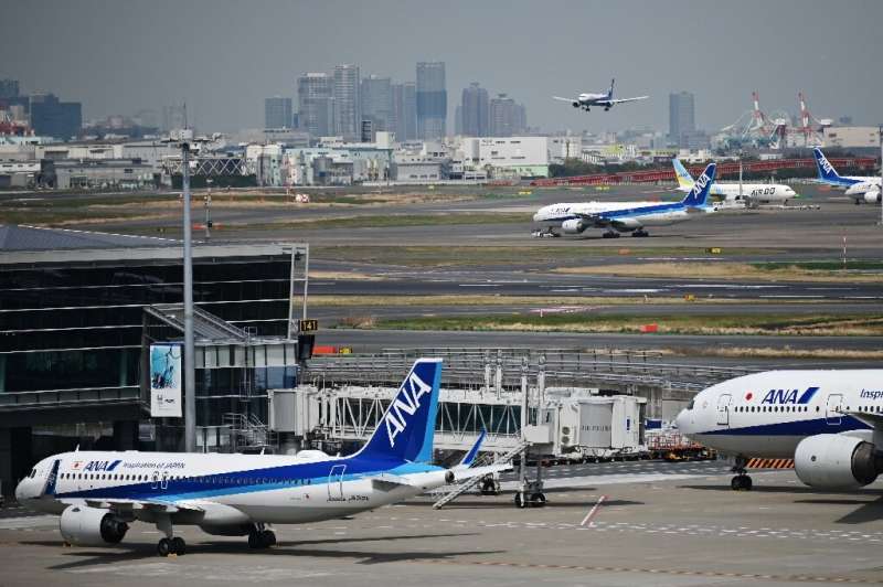 Japanese carrier ANA has sharply downgraded its profit forecasts over the coronavirus pandemic