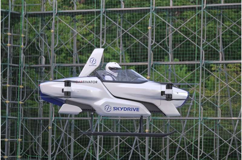 Japan's 'flying car' gets off ground, with a person aboard