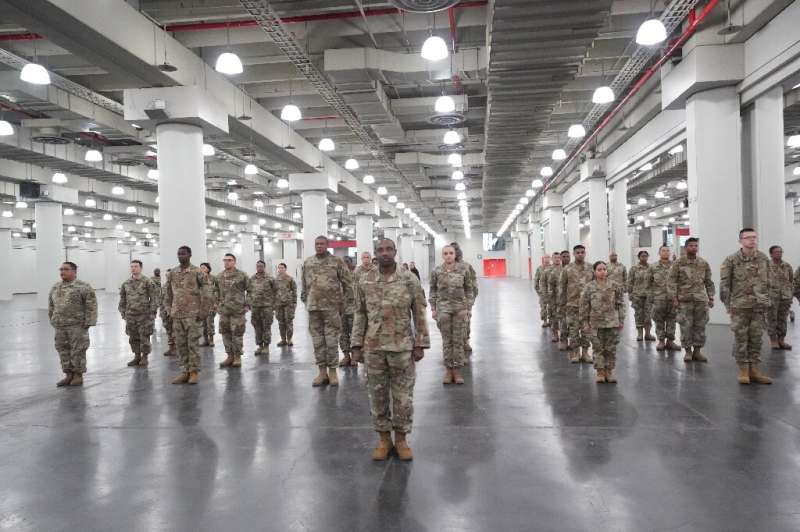 Members of the Army National Guard deploy at New York's Jacob Javits Center as New York Governor Andrew Cuomo announces plans to