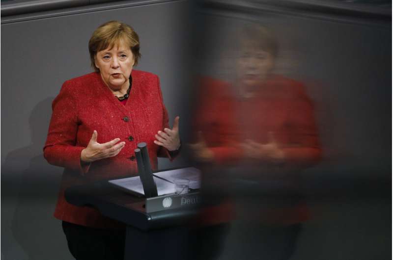 Merkel backs tougher virus curbs as German deaths hit record
