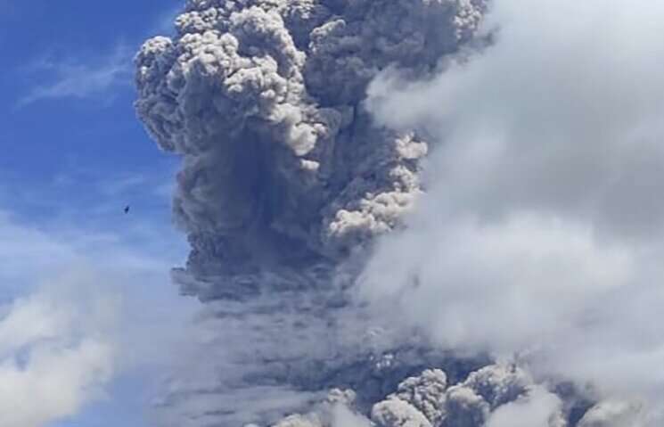 Mount Sinabung emits ash and smoke into the air