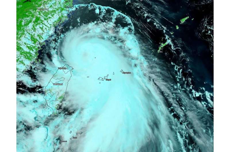 NASA finds an eye and a giant 'tail' in Typhoon Hagupit