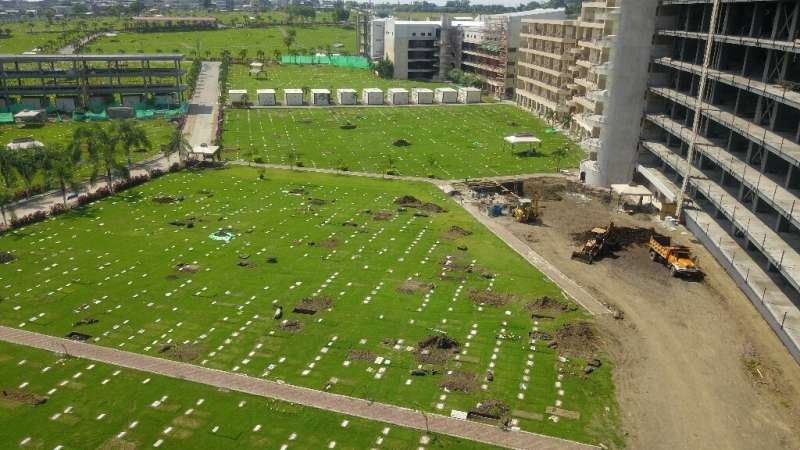 New graves at the Jardines de la Esperanza cemetery in Guayaquil, Ecuador
