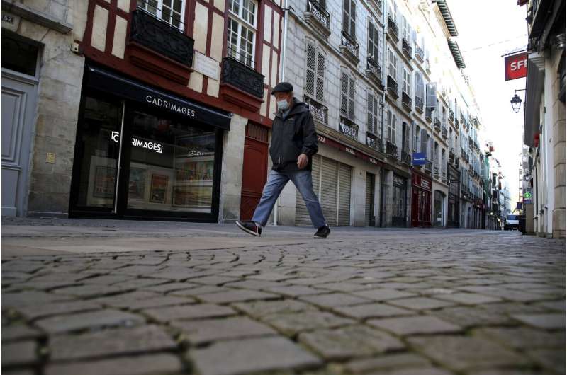 Parisians flee, sidewalks empty as France enters lockdown