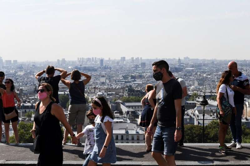People must now wear masks at Paris spots like Montmartre, famous for its viewover the French capital's skyline