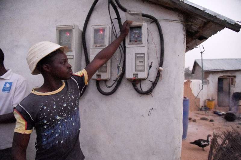 Pre-paid meters are installed on homes in Takpapieni—householders buy credit to access electricity from the mini-grid