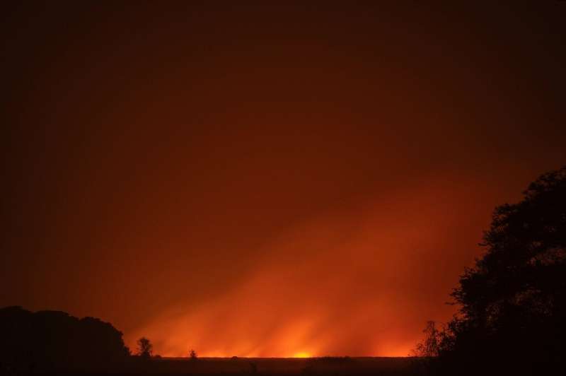 Red glow from fire is seen at the wetlands of Pantanal in Brazil on September 13, 2020
