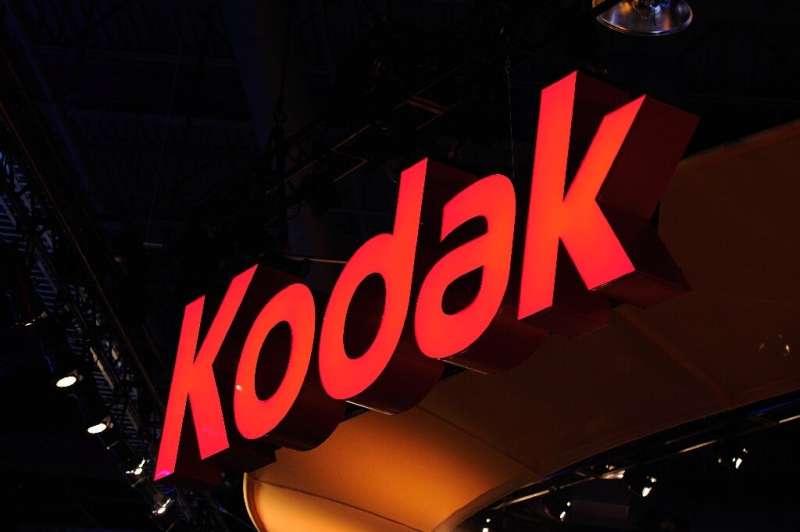 Shares of Eastman Kodak plunged after a US agency suspended activity on a $765 million loan to support the company's shift into 