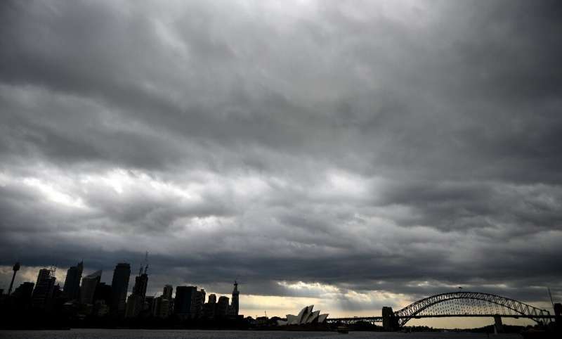 Storm clouds over Sydney Harbour gave some relief  after weeks of intense bushfires