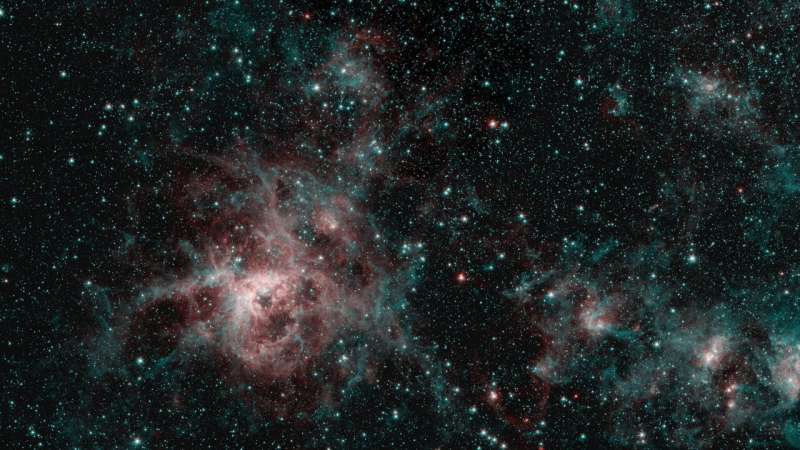 Tarantula Nebula spins web of mystery in Spitzer image