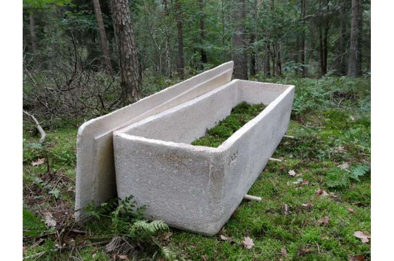The coffin turns corpses into compost that enriches the soil