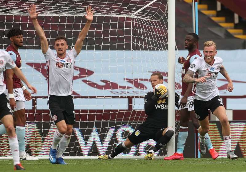 The English Premier League resumed after a 100-day shutdown when Aston Villa hosted Sheffield United at an empty Villa Park
