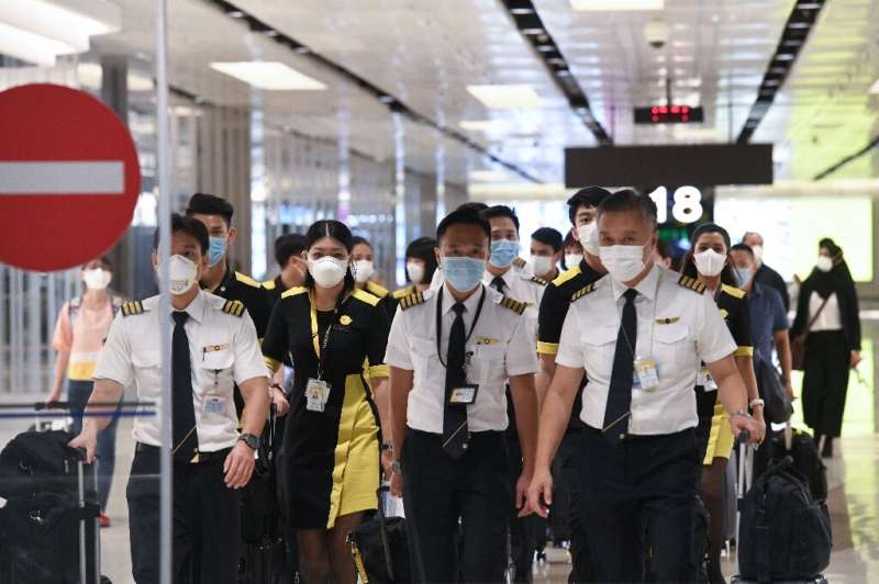 The flight crew of the chartered Scoot airline that flew to Wuhan to evacuate Singaporean nationals, arrives at Changi internati