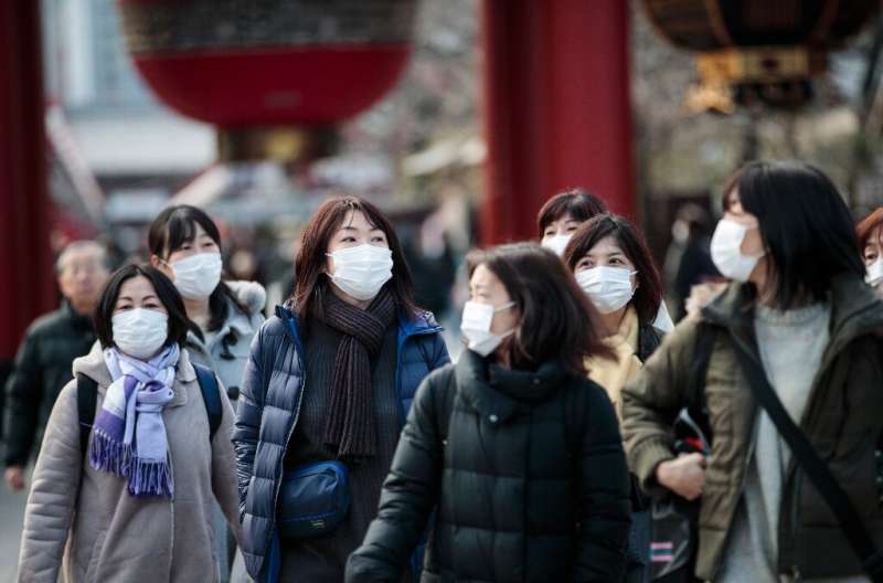 The health ministry said as of Monday that 20 people in Japan have tested positive for the new virus, of whom four showed no sym