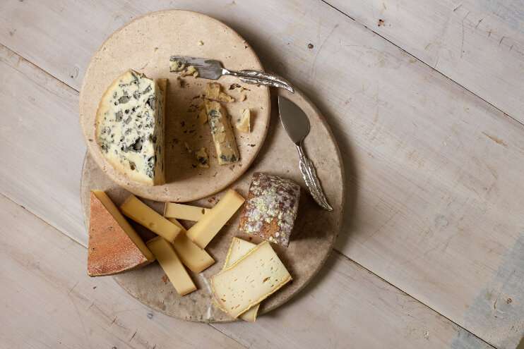 Those funky cheese smells allow microbes to 'talk' to and feed each other