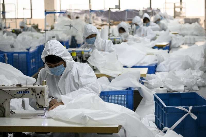Ugly Duck Industry in Wenzhou, eastern China, has switched production from winter coats to hazmat suits