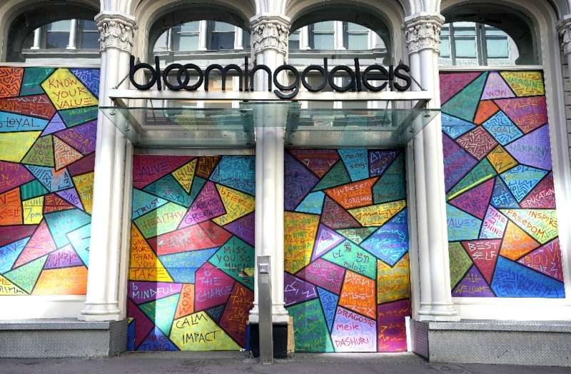 While some stores in New York reopened for curbside pick-up, Bloomingdale's remained boarded up in the wake of looting sparked b