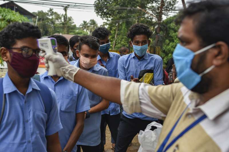 WHO warns that 1st wave of pandemic not over, dampens hopes
