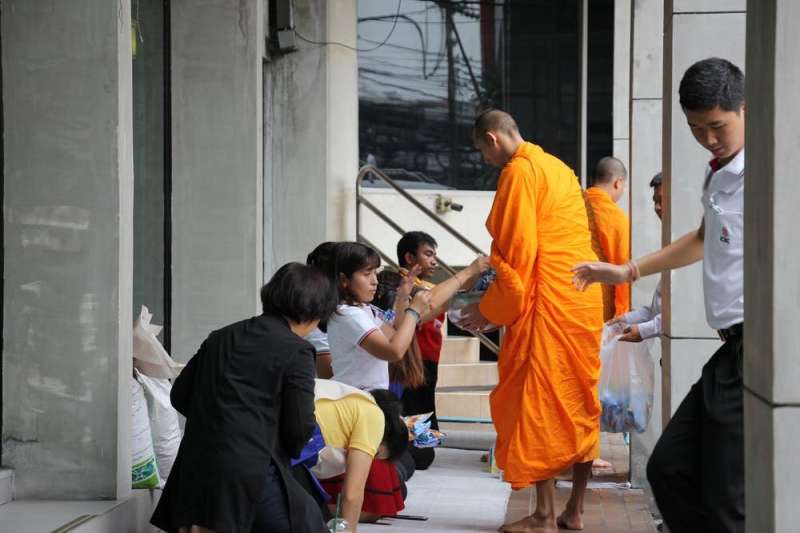 Why Buddhist monks collect alms and visit households even in times of social distancing
