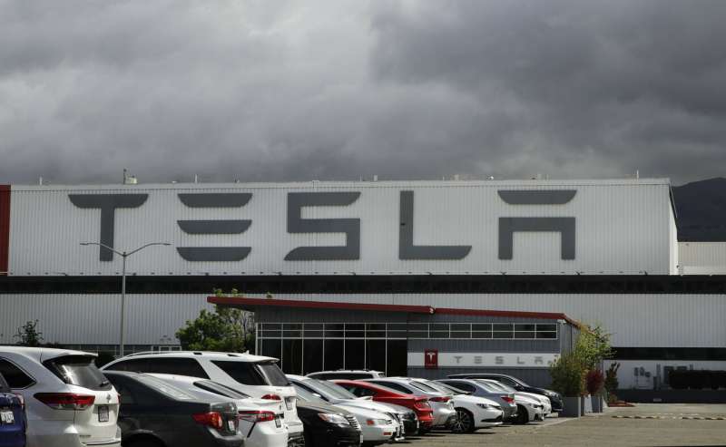 Workers: Tesla threatens firing if they don't return to jobs