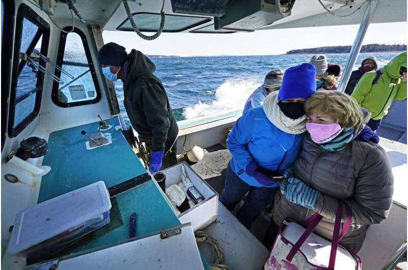 Boat, snowmobile, camel: Vaccine reaches world's far corners